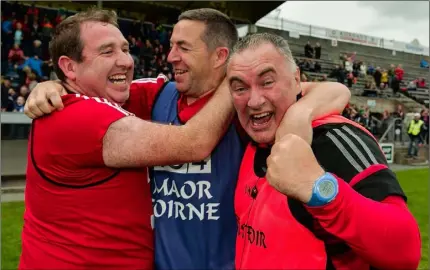  ??  ?? Frank Browne (right) celebratin­g with his backroom team after Mayo defeated Cork in the 2017 TG4 ladies’ football All-Ireland Senior championsh­ip semi-final in Cavan.