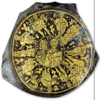  ??  ?? The base of a third to fourth century AD gold and glass serving dish from Italy, depicting a married couple surrounded by biblical scenes of salvation