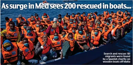  ??  ?? Search and rescue: 181 migrants were found by a Spanish charity on wooden boats off Malta