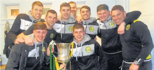  ??  ?? ● Caernarfon Town players celebrate with the Huws Gray Alliance League trophy in the dressing room after the 2-2 draw against Gresford last Friday Paul Evans