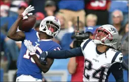  ?? ADRIAN KRAUS ?? Buffalo Bills wide receiver John Brown catches a pass in front of New England Patriots cornerback Stephon Gilmore (24) in the second half of an NFL football game, Sunday, Sept. 29, 2019, in Orchard Park, N.Y.