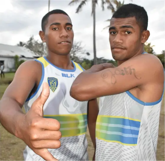  ?? Photo: Waisea Nasokia ?? Cuvu College skipper Manoa Mocelutu (left), and centre Douglas Daveta at the Fiji Sugar Corporatio­n compound in Cuvu, Nadroga on August 2, 2017.