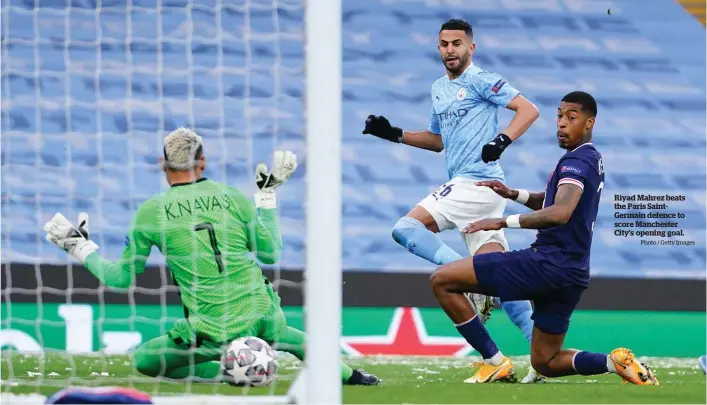  ?? Photo / Getty Images ?? Riyad Mahrez beats the Paris SaintGerma­in defence to score Manchester City’s opening goal.