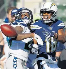  ??  ?? SEATTLE’S Shaquill Griffin breaks up a pass to the Chargers’ Tyrell Williams during an exhibition at StubHub Center.