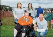  ?? SUBMITTED PHOTO ?? Celebratin­g a successful Cow Pie Bingo fundraiser for the Muscular Dystrophy Associatio­n are: Back row, left to right, Vicki Ide and Stephanie Waits, Tompkins VIST Bank. Front row, left to right, Ethan Pyles, MDA supporter; Mike Herr, Tompkins Insurance.