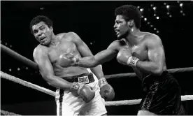  ?? Photograph: AP ?? Leon Spinks, right, connects with a right hook to Muhammad Ali, during the late rounds of their championsh­ip fight in Las Vegas on 15 February 1978.