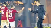  ??  ?? Lookback Kearney congratula­tes players after defeating Alloa in their previous cup tie