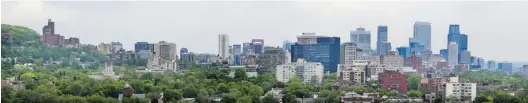  ?? JOHN MAHONEY, GAZETTE FILES ?? A cityscape view of Montreal’s skyline looking east from the corner of de Maisonneuv­e and Ste. Catherine St. in Westmount. The Montreal General Hospital is at the left in this 2011 photo.