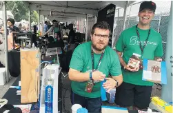  ??  ?? ALEXANDER PANETTA/The Canadian Press Andrew Finkle and Charles Mire, the co-founders of Canadian startup Structur3D, show off the 3D printer adapter they used to create a New York Yankees
logo out of Nutella at the Maker Faire festival in Queens,...