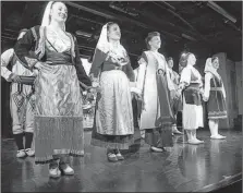  ?? PHOTO BY JOHN NOWLAN ?? A folk dance troupe performs in Montenegro.