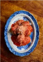  ??  ?? Roll with it: Russell Norman gets hands-on shaping Italian meatballs — ideal in a rich tomato sauce with grated Parmesan