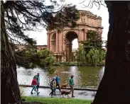  ?? Santiago Mejia/The Chronicle 2021 ?? People walk at the Palace of Fine Arts, which will host next year’s S.F. Silent Film Fest.