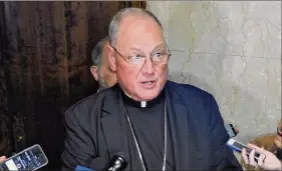  ?? John Carl D'annibale / Times Union archive ?? The strategy of the Catholic Church moving money from its holdings into trusts or foundation­s has been tied to Cardinal Timothy Dolan.