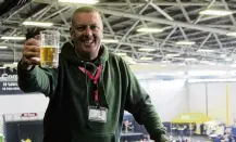  ?? ?? Here’s to success . . . Southland Beer, Wine and Wild Food Festival manager Kevin Downie raises a glass to celebrate how well the event turned out.