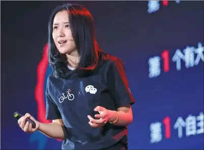  ?? ZHANG YUWEI / XINHUA ?? Hu Weiwei, founder of bicycle-sharing startup Mobike Technology Co Ltd, speaks at a news conference in Beijing.