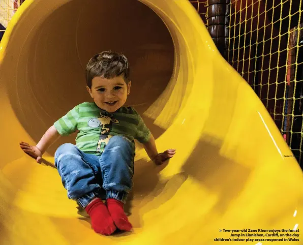  ?? Gareth Everett ?? > Two-year-old Zane Khen enjoys the fun at Jump in Llanishen, Cardiff, on the day children’s indoor play areas reopened in Wales