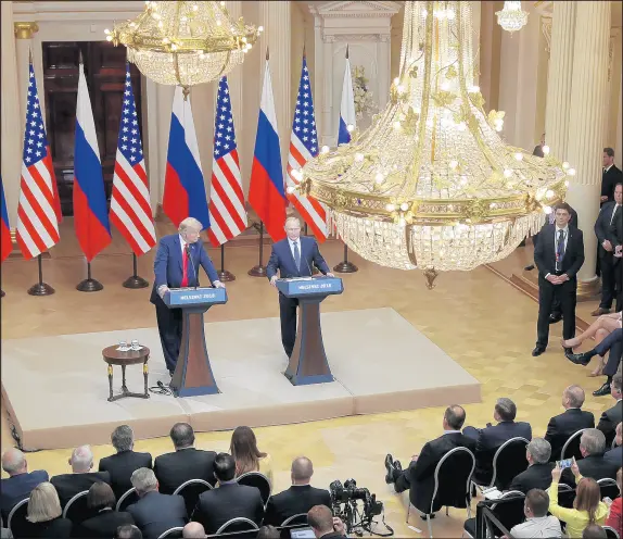  ?? MARKUS SCHREIBER/AP ?? U.S. President Donald Trump and Russian President Vladimir Putin meet Monday at the Presidenti­al Palace in Helsinki.