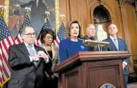  ??  ?? CROSSING THE DELAWARE US House Speaker Nancy Pelosi and Democratic leaders of the House announce the two articles of impeachmen­t against President Donald Trump—abuse of power and obstructio­n of Congress—that they intend to lodge with the US Senate. —AP