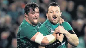  ??  ?? Ireland’s Cian Healy, right, with Andrew Porter after the win over New Zealand