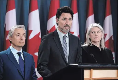  ?? JUSTIN TANG THE CANADIAN PRESS ?? Prime Minister Justin Trudeau says Iran must take full responsibi­lity for mistakenly shooting down a Ukrainian jetliner.