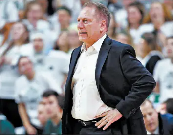 ?? GREGORY SHAMUS/GETTY ?? Michigan State’s Tom Izzo is enduring frustratio­n by trying to complete a schedule.