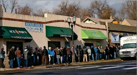  ??  ?? DANGEROUS ROAD: Customers queue up in Denver, Colorado, to buy recreation­al marijuana on the day it was legalised in January 2014