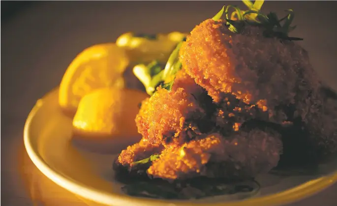  ?? photos Luis Sánchez Saturno/The New Mexican ?? Fried Washington State oysters,