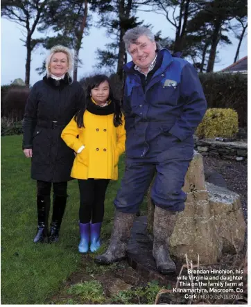  ?? PHOTO: DENIS BOYLE ?? Brendan Hinchion, his wife Virginia and daughter Thia on the family farm at Kilnamarty­ra, Macroom, Co Cork