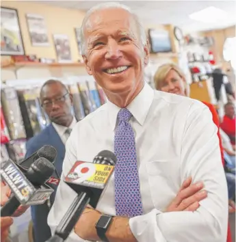  ?? JOHN MINCHILLO/AP ?? Former Vice President Joe Biden talks to the news media June 29 in Cincinnati. He plans to make multiple campaign stops weekly this fall for Democratic candidates.