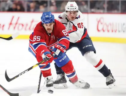  ?? JOHN MAHONEY ?? Canadien Andrew Shaw fights off a check by Washington Capital Andre Burakovsky during a game in November. Shaw’s addition to the top line has opened up a lot of opportunit­ies for linemates Max Domi and Jonathan Drouin, writes Marc Dumont.