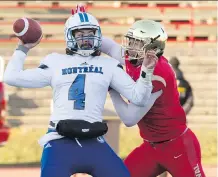  ?? JACQUES BOISSINOT/THE CANADIAN PRESS ?? Laval Rouge et Or defensive end Mathieu Betts, right, has caught the eye of some NFL scouts.