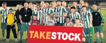  ??  ?? Bodedern Athletic celebrate winning the Take Stock Van Hire Cup