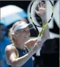  ?? DITA ALANGKARA — THE ASSOCIATED PRESS ?? Caroline Wozniacki, above. and Simona Halep, below, celebrate after winning their semifinals at the Australian Open on Thursday.