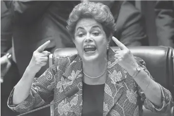  ?? MARIO TAMA ?? President Dilma Rousseff, who was removed from office by Senate vote Wednesday, answers a question from a senator during nearly 14 hours of questionin­g during her impeachmen­t trial.