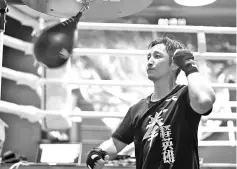  ??  ?? This file picture taken on July 12, 2017 shows Chinese boxer Zou Shiming training in a gym in Shanghai. - AFP photo