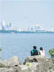  ?? CHRISTOPHE­R KATSAROV / THE CANADIAN PRESS ?? A new poll finds that housing affordabil­ity concerns have surpassed transit worries for Toronto-area residents.