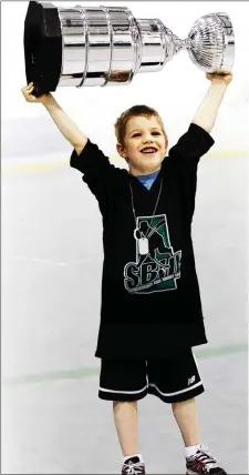  ??  ?? Winning teams in the Saskatchew­an Ball Hockey League receive cups that are replicas of the Stanley Cup.