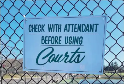  ?? Grace Duffield / Hearst Connecticu­t Media ?? A sign at the New Canaan High School tennis courts on Jan. 25. A fee may be imposed for use of the tennis courts at the school.