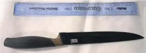  ??  ?? The large kitchen knife which Gavin Wilkinson had outside a property in Ogmore Vale, Bridgend