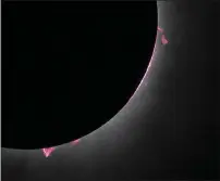  ?? KEEGAN BARBER — NASA VIA AP ?? Solar prominence­s are seen during a total solar eclipse in Dallas, Texas on Monday.