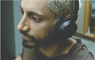  ?? AMAZON STUDIOS ?? Riz Ahmed plays a heavy metal drummer whose life begins to unravel when he develops hearing loss in the movie Sound of Metal.