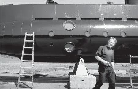  ??  ?? Danish inventor Peter Madsen shows off his submarine in 2008. He is accused of torturing a Swedish journalist before he either cut her throat or strangled her on the vessel.