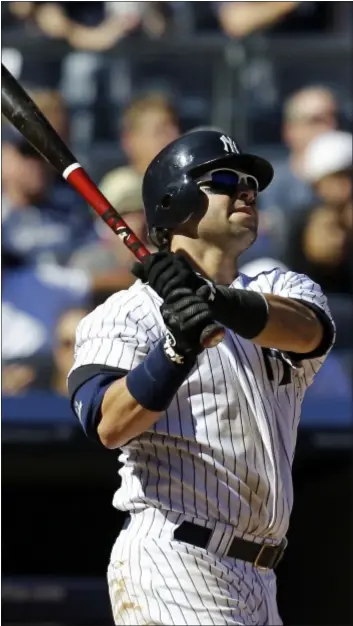  ?? AP Photo ?? Nick Swisher hit a home run, but the Yankees couldn’t get by the A’s on Sunday in the Bronx.