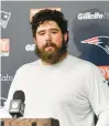  ?? ADRIAN KRAUS/AP ?? New England Patriots center David Andrews speaks during a Jan. 8 news conference after their game against the Buffalo Bills in Orchard Park.