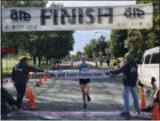  ?? NICHOLAS BUONANNO — NBUONANNO@DIGITALFIR­STMEDIA.COM ?? 28-year-old Allison Konderwich of Valatie is the first female to finish the Arsenal City Run 5K race in Watervliet on Sunday morning.