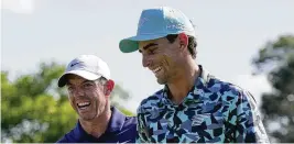  ?? DAVID J. PHILLIP / ASSOCIATED PRESS ?? On the day after the Masters, Rory McIlroy (left) again found himself addressing rumors that he’s close to signing a lucrative deal to join LIV Golf, the Saudi-funded tour. “I’ll play the PGA Tour the rest of my career,” he insisted.