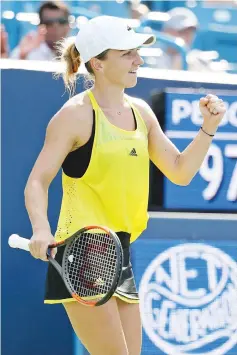  ??  ?? Simona Halep of Romania celebrates after defeating Sloane Stephens during Day 8 of the Western and Southern Open at the Linder Family Tennis Center on August 19, 2017 in Mason, Ohio. - AFP photo