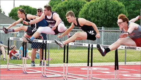  ?? TIMES photograph­s by Annette Beard ?? Senior Blackhawk Justin Koon won first place in the 300-meter hurdles (42.78) and fourth in the 110-meter hurdles with a time of 16.314.