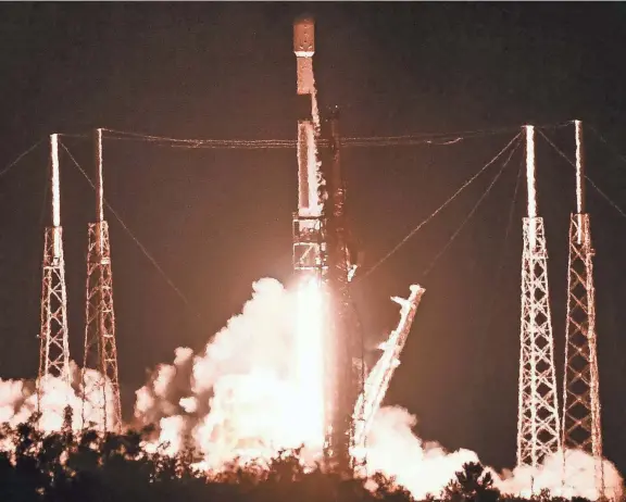  ?? CRAIG BAILEY/FLORIDA TODAY ?? A SpaceX Falcon 9 rocket lifts off from Cape Canaveral Space Force Station on Nov. 27 in Florida. The rocket is carrying 23 Starlink satellites.