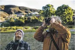  ?? Los Angeles Times ?? Mel Melcon
RICHARD RACHMAN, right, and Patt Healy spend their time looking for Western monarchs in such places as a Malibu gated community, center, and a golf course in Venice where Rachman saw Cassin’s kingbirds try to eat them, far left.